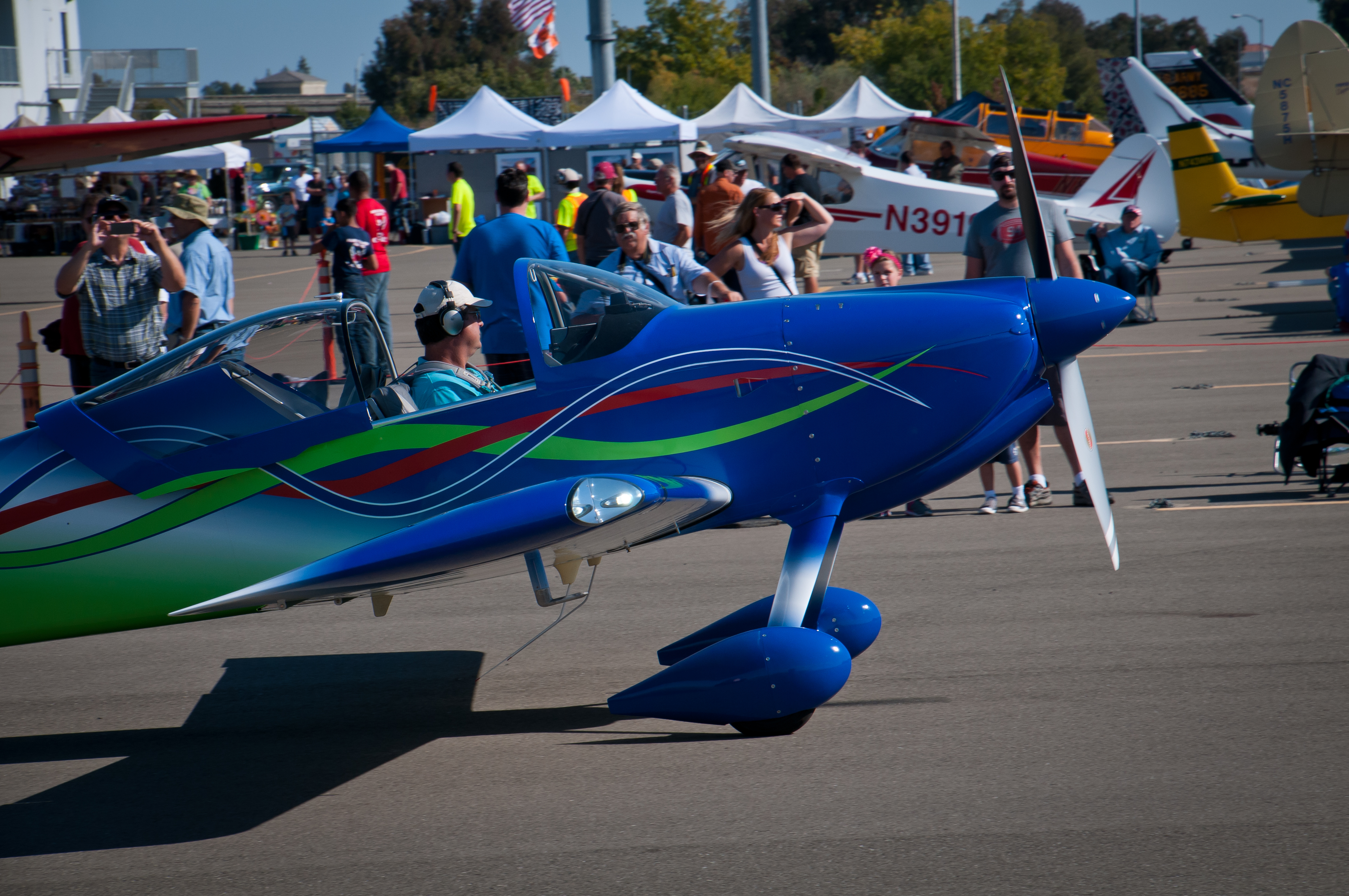 An RV-14 taxies past spectators at an aviation event. 2014 file photo.